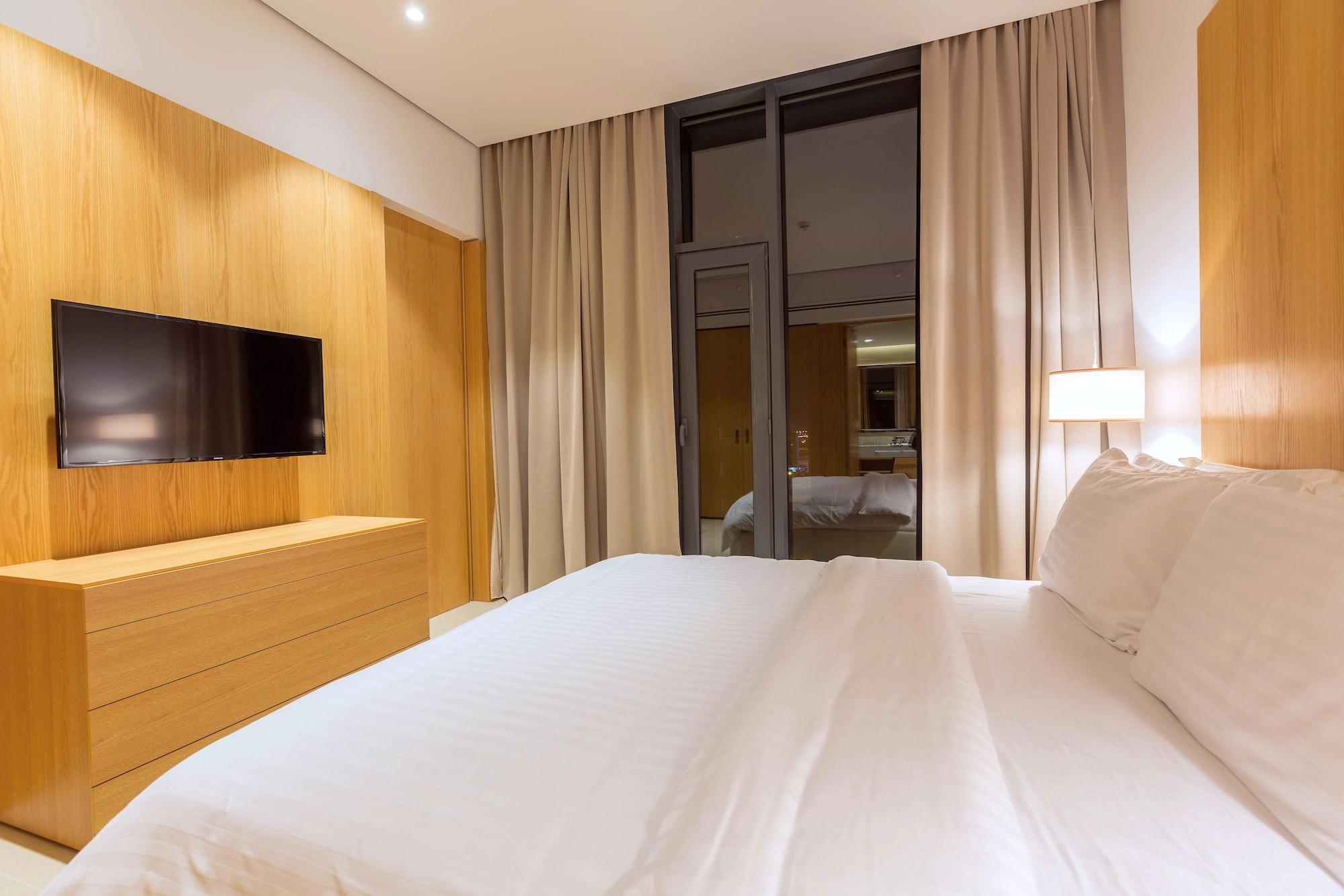 Delta Hotel Apartments Kuwait City Exterior foto A bedroom at the hotel