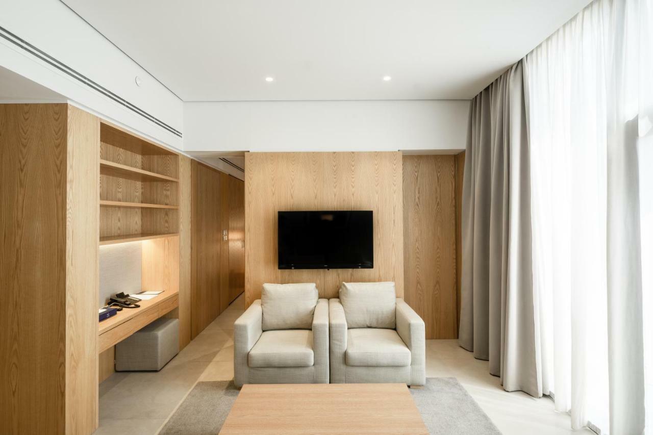 Delta Hotel Apartments Kuwait City Exterior foto A living room at the hotel